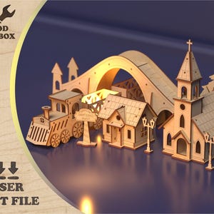 May include: Laser-cut wooden Christmas village set, including a train, bridge, house, church, and trees. The set is made of light-colored wood and is displayed on a blue surface. The image also includes the text "WOOD TOOLBOX" and "LASER CUT FILE".
