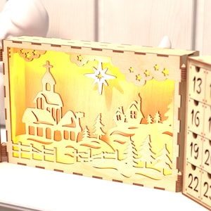 Calendario de adviento de madera con forma de libro. Archivos láser. Calendario de adviento con escenas navideñas. Cuenta regresiva de adviento de madera. Formatos SVG, CDR, DXF y otros