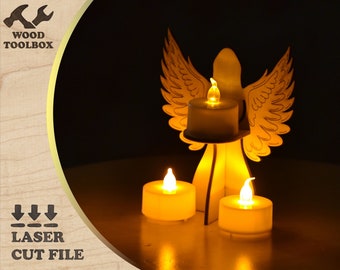 May include: A wooden angel candle holder with three tea lights. The angel has wings and is standing on a base. The tea lights are lit and glowing.