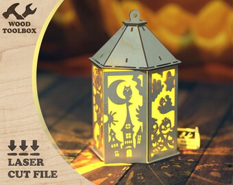 Peut inclure: Une lanterne d'Halloween en bois avec une lumière à l'intérieur. La lanterne est décorée de fantômes, de citrouilles, d'un hibou et d'une lune croissante. La lanterne est en bois découpé au laser et est prête à être assemblée.
