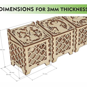 May include: A set of three wooden boxes with intricate cut-out designs. Each box measures 72 mm x 69 mm x 96 mm and is 3 mm thick. The boxes are arranged in a row, with the front box featuring a bunny design.