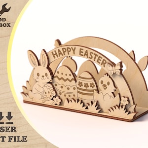 Könnte beinhalten: Lasergeschnittene Osterdekoration aus Holz mit Hase, Küken und verzierten Eiern. Der Bogen trägt die Aufschrift "HAPPY EASTER". Das Design umfasst Gras und einen Schmetterling. Das Wood Toolbox-Logo und der Text "LASER CUT FILE" sind sichtbar.