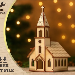 May include: A laser-cut wooden church model with a cross on top. The model has arched windows and a detailed roof. The Wood Toolbox logo is visible in the upper left corner, and the words "LASER CUT FILE" are at the bottom.