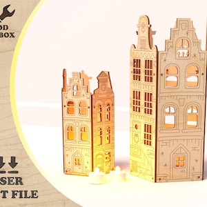 Może przedstawiać: Trzy modele drewnianych domów wyciętych laserowo ze skomplikowanymi detalami architektonicznymi. Domy mają okna i drzwi i są podświetlane od wewnątrz. Widoczny jest tekst "WOOD TOOLBOX" i "LASER CUT FILE". Domy są przeznaczone do przechowywania świec.