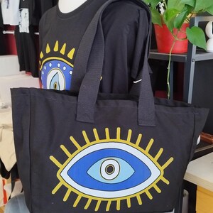 T-shirt Evil Eye avec sac en coton. Sac en coton élégant. Mauvais OeilCadeaux De Noël