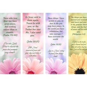 May include: Four floral bookmarks with inspirational quotes. Each bookmark features a different flower at the bottom and a unique color scheme. The text includes Bible verses and motivational phrases. The bookmarks are designed with a soft, blurred background.
