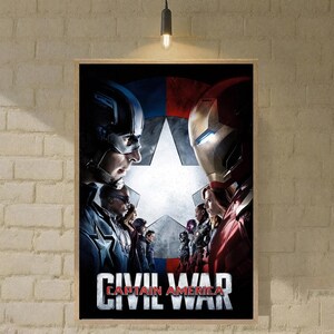 May include: Framed movie poster for Captain America: Civil War. The poster shows Captain America and Iron Man facing each other, with other characters in the background. The title "CIVIL WAR" is displayed at the bottom.