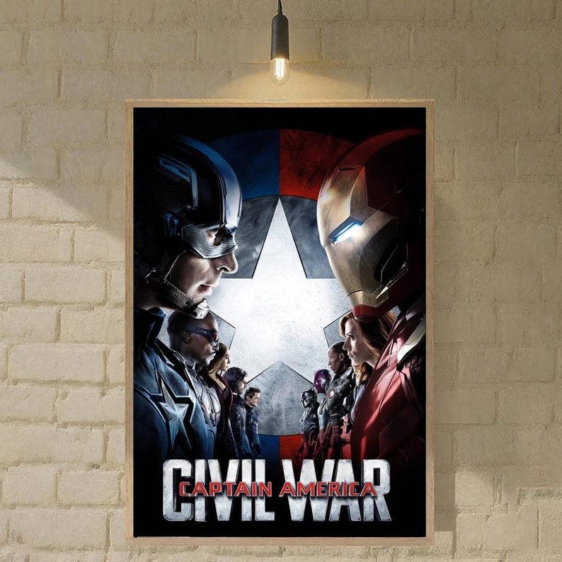 May include: Framed movie poster for Captain America: Civil War. The poster shows Captain America and Iron Man facing each other, with other characters in the background. The title "CIVIL WAR" is displayed at the bottom.