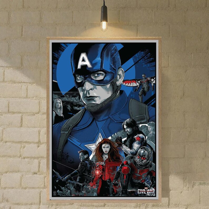 May include: Framed poster featuring Captain America in a blue and white costume, with other characters from the Civil War film. The poster has a wooden frame and is hanging on a brick wall.