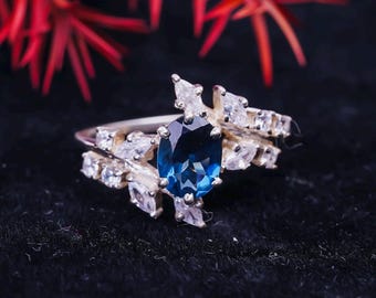 Oval London Blue Topaz Ring: Marquise Moissanite, 925 Silver