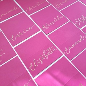 Segnaposti eleganti in calligrafia d’oro