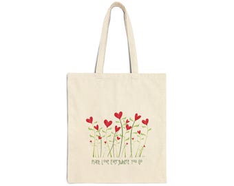 Bolso de mano con flores en forma de corazón dibujadas a mano / Ilustración floral de amor