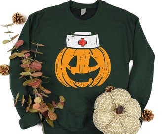 Pumpkin Nurse Sweatshirt,Halloween Sweatshirt,Fall Nursing Shirt,Spooky Season Nurse,Medical Tech,Healthcare Halloween,Nurse Team Sweater