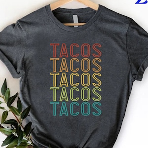a t - shirt with the words tacos on it