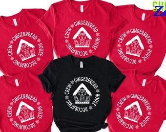 May include: Five t-shirts with a white gingerbread house design. The shirts are red and black. The text on the shirts reads "Crew Gingerbread House Decorating".