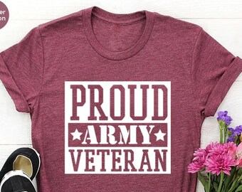 May include: A heather maroon t-shirt with the text "PROUD ARMY VETERAN" in white lettering.
