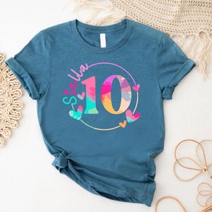 a t - shirt with the number ten printed on it