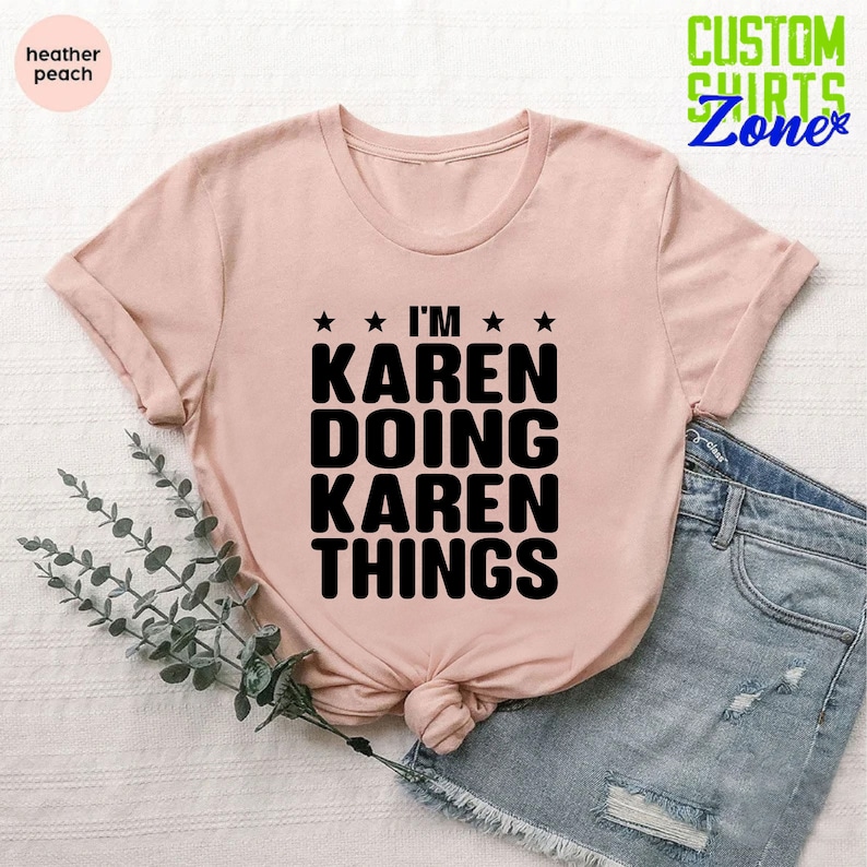 May include: A pink t-shirt with the text "I'm Karen Doing Karen Things" printed in black.