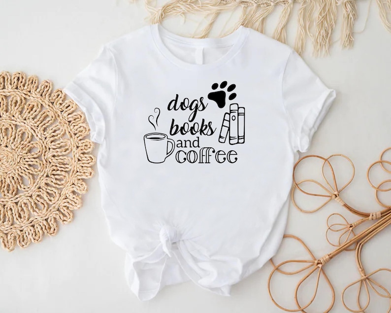 a t - shirt that says dogs drinks coffee