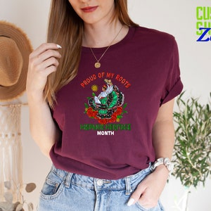 a woman wearing a t - shirt with a dragon on it