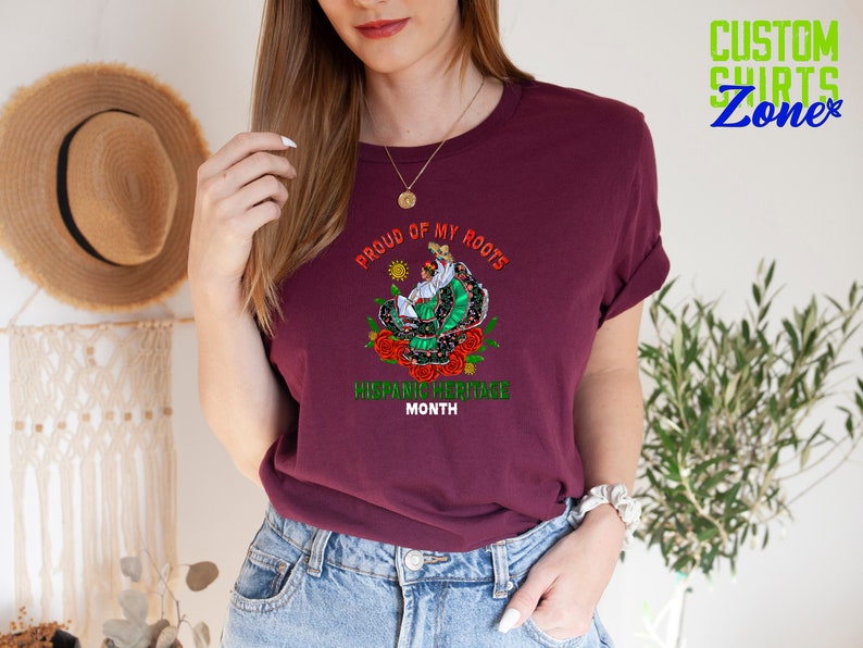 a woman wearing a t - shirt with a dragon on it