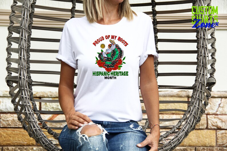 a woman wearing a t - shirt with a dragon on it