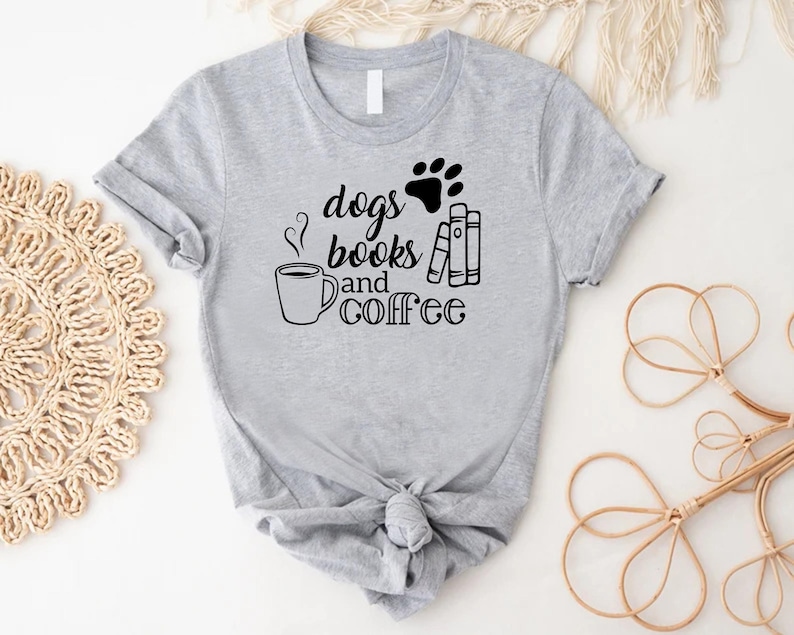a t - shirt that says dogs books and coffee