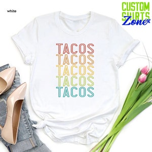 a t - shirt with the words tacos on it