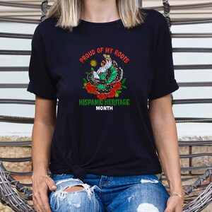 a woman wearing a t - shirt with a dragon on it