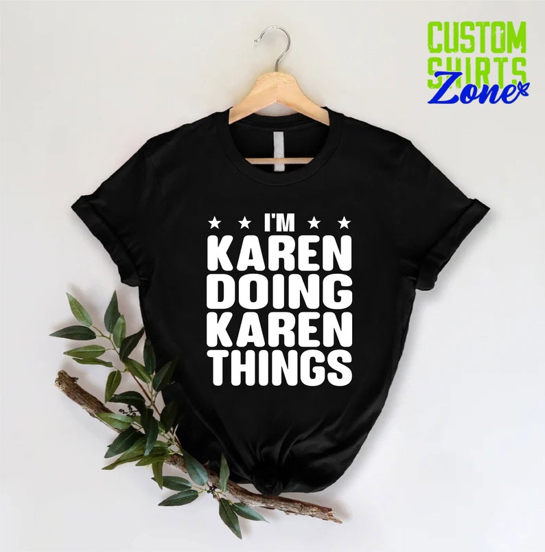 May include: Black t-shirt with white text that reads "I'm Karen Doing Karen Things" with three stars above and below the text.