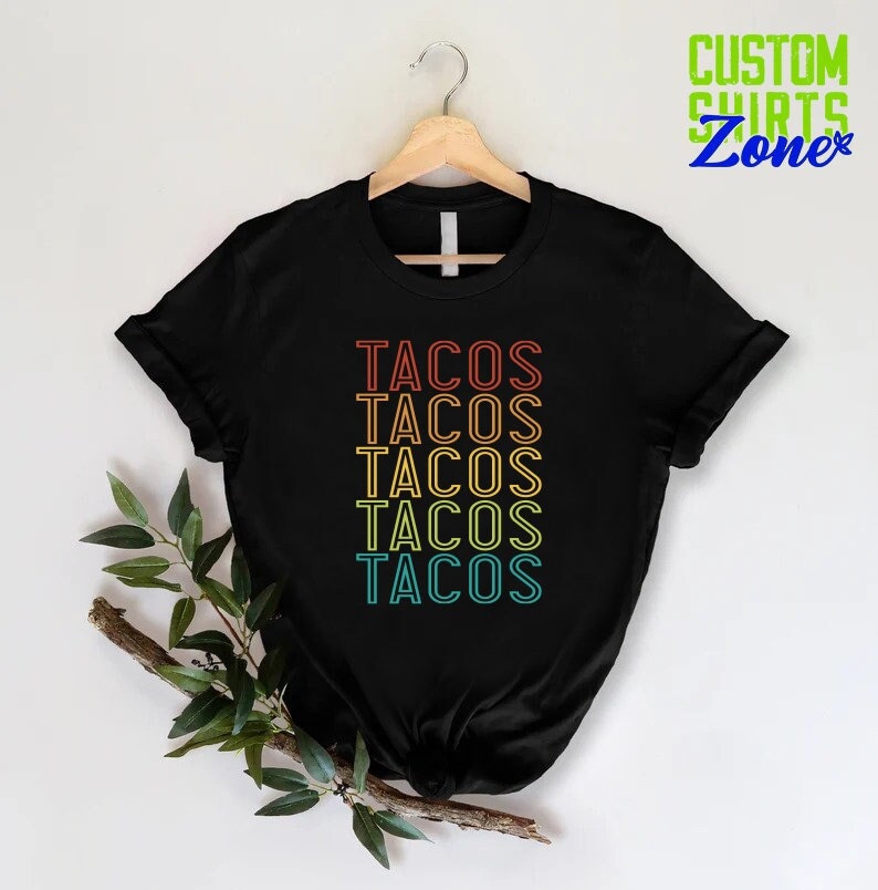 a black shirt with the words tacos on it