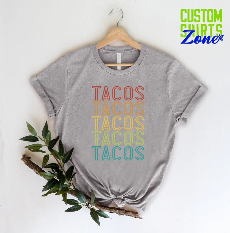 a t - shirt with the words tacos on it