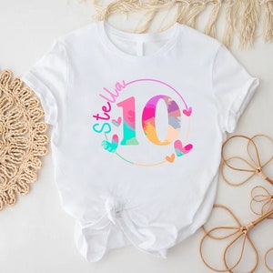 a white shirt with the number ten printed on it