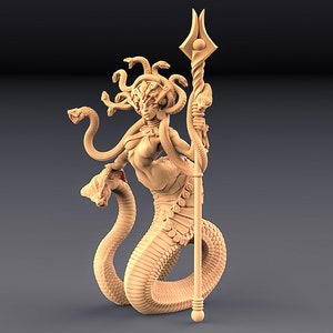 May include: A beige figurine of a female figure with snakes for hair, holding a spear. She is depicted as a serpent with a human torso and a snake tail. The figurine is made of a smooth, matte material.