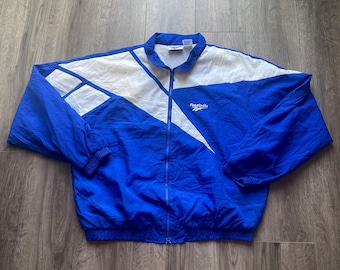 Vintage 90s Cleveland Cavaliers Windbreaker Jacket / Retro Track Jacket / Athletic Sportswear / Streetwear / Reebok Full Zip / Blue White