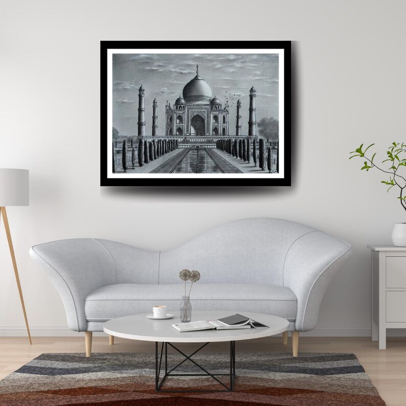 May include: A black and white pencil drawing of the Taj Mahal, a famous mausoleum in India. The drawing shows the building's intricate details and symmetrical design, with a reflecting pool in the foreground.