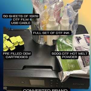 May include: An Epson XP15000 printer with included supplies. The image shows a full set of DTF ink, 50 sheets of 13x19 DTF film, a USB cable, pre-filled OEM cartridges, and 500g of DTF hot melt powder.