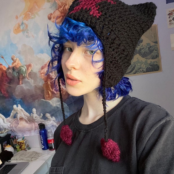 Bonnet à oreilles de chat avec trois étoiles et pompons au crochet