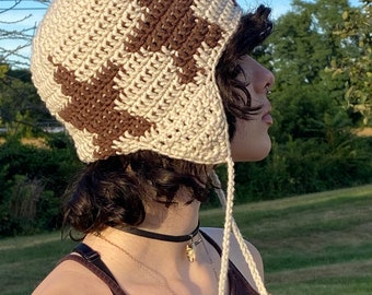 crochet ear flap hat with stars and pompoms, hand knitted hat