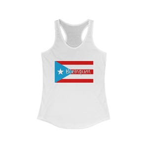 May include: White tank top featuring a red, white and blue Puerto Rican flag design. The flag has a white star in the blue triangle and the word "Boriquen" written in cursive below the flag.