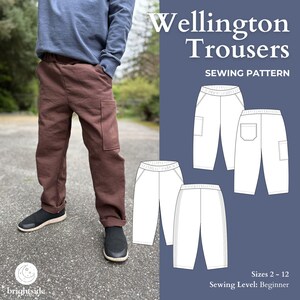 May include: Brown Wellington trousers with a cargo pocket, modelled with a blue sweatshirt and black shoes. The image also shows a sewing pattern with illustrations of the trousers. Text on the image reads "Wellington Trousers" and "Sewing Pattern".