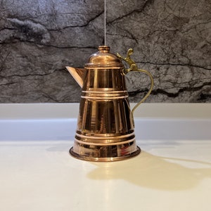 Handcrafted Conical Copper Milk Jug with Brass Handle: Embossed Design
