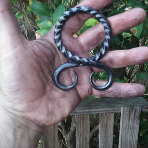 Hand forged blackend Light Troll Cross belt buckle