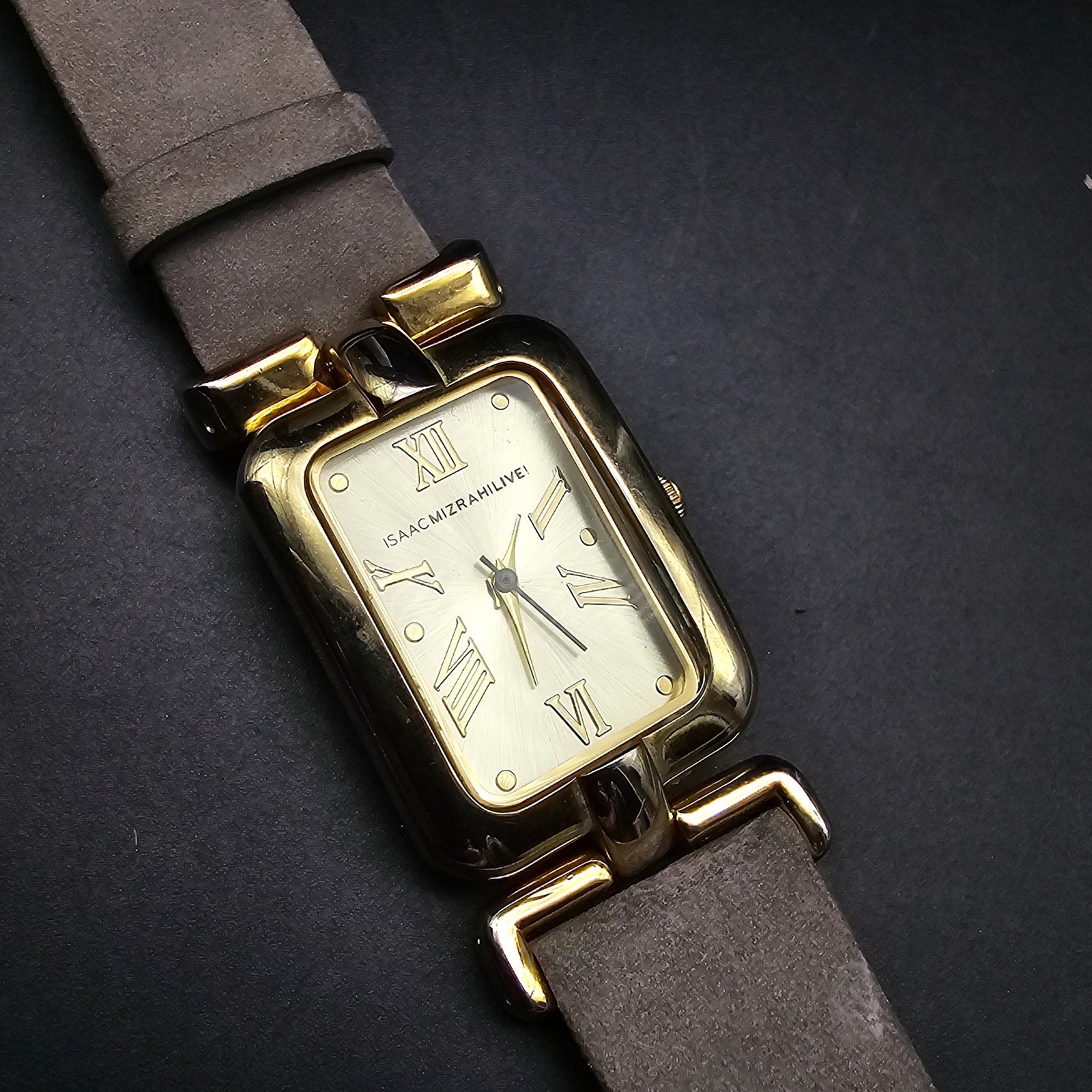 Isaac Mizrahi Gold Tone Watch with White Dial and Black Roman Numerals Isaac Mizrahi Live Wrist Watch Black Band Gold Tone  main image 4
