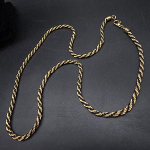Gold Tone Twisted Chain Necklace Black Cord Costume Jewelry