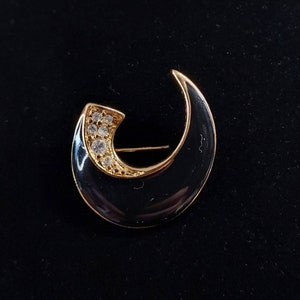 Vintage Trifari Black Enamel Brooch Rhinestones and Gold Tone
