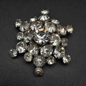 Rhinestone Star Snowflake Brooch Silver Tone Vintage Glam Costume Jewelry