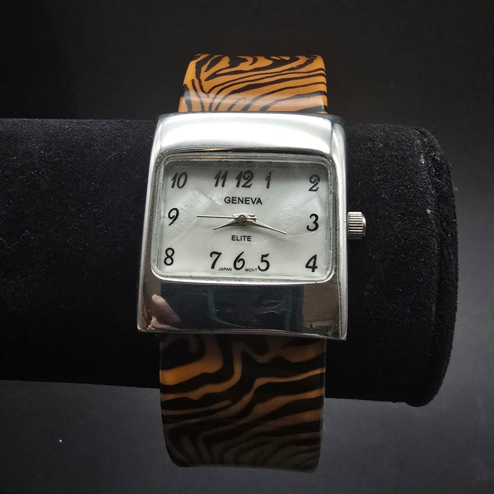 Geneva Platinum Watch with Gold and Black Animal Print Band Love it or hate it…you cannot ignore it! ? The Rolex  main image 4