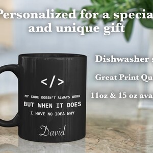 a black coffee mug sitting on top of a table