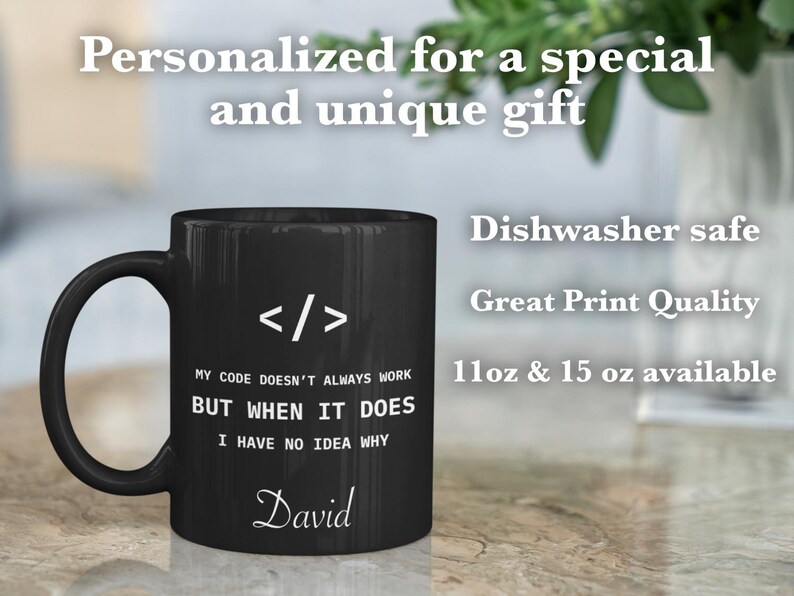 a black coffee mug sitting on top of a table